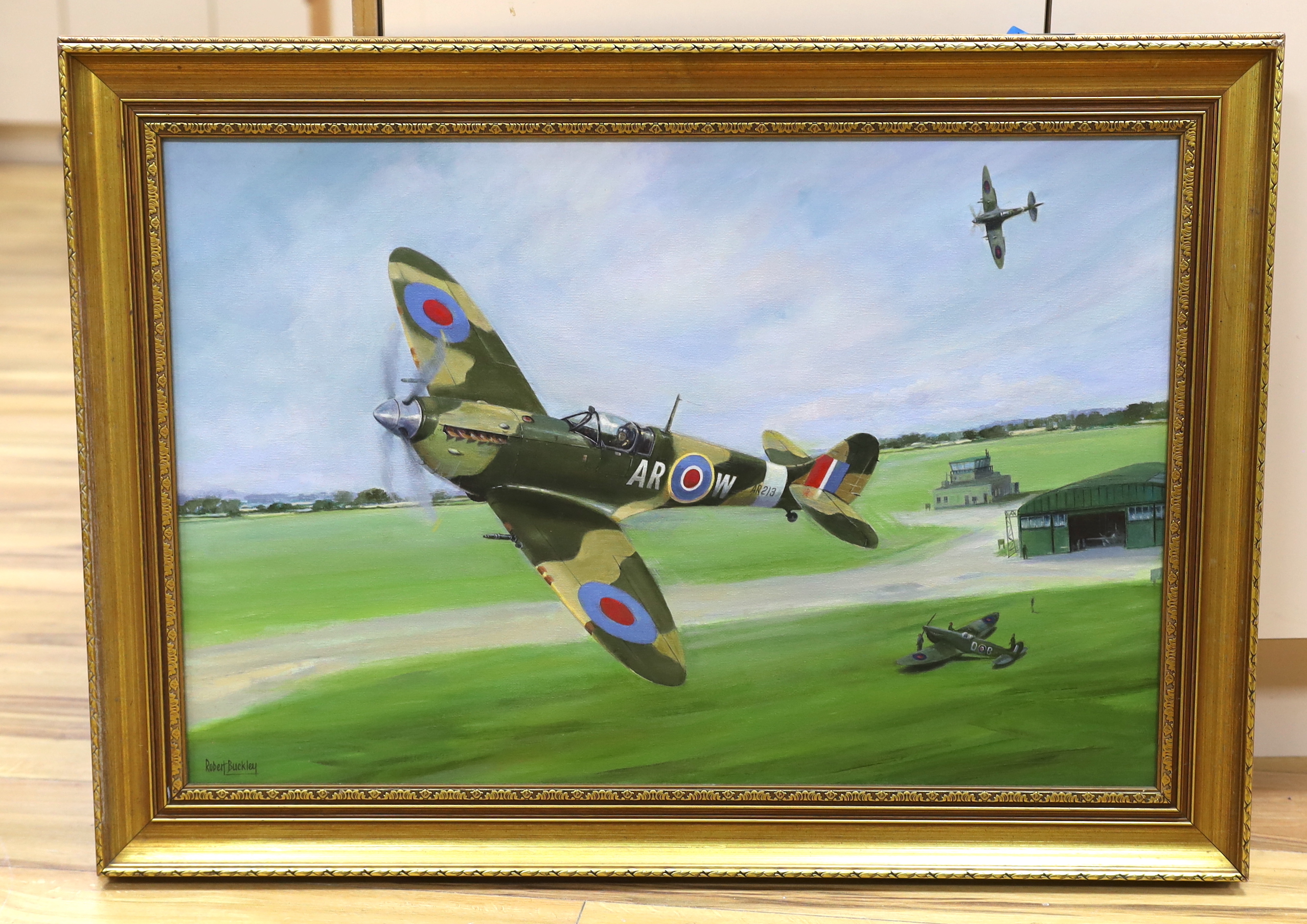 Robert Buckley, oil on canvas, Airfield with spitfires in flight, signed, 49 x 74cm